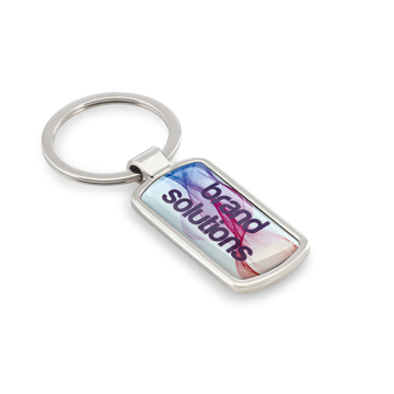 a rectangular shaped keyring with round edges that has a full colour domed label to the centre