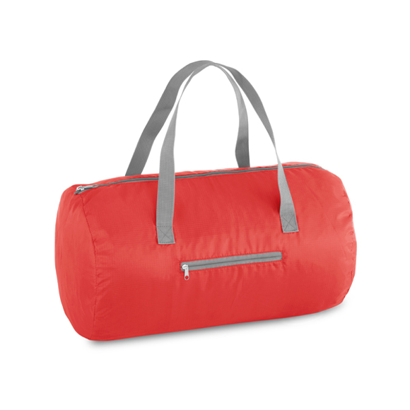 Foldable gym bag in red with grey straps and details