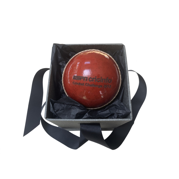 Engraved Full Size Cricket Ball in red presented in a gift box with ribbon