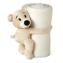 teddy bear holding cream blanket
