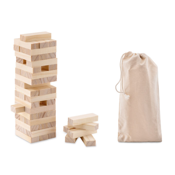 wooden toppling tower game with a large stack of block and a cotton bag