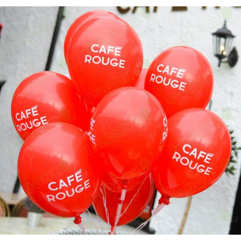 a bunch of red latex balloons