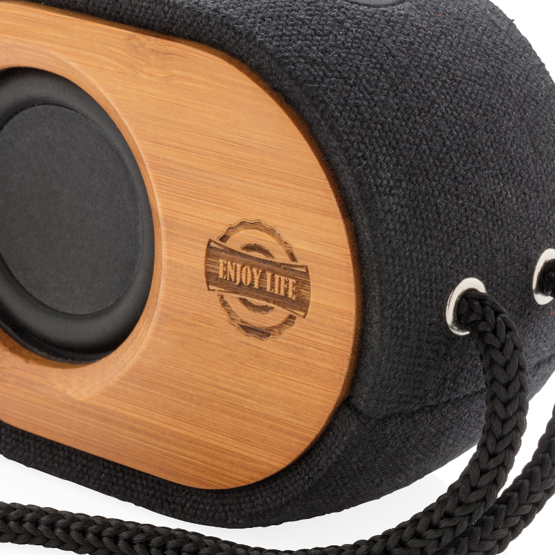 Bamboo X Eco Bluetooth Speaker in bamboo and black with black strap close up with logo imprinted
