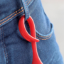 red belt clip keyring on a belt loop