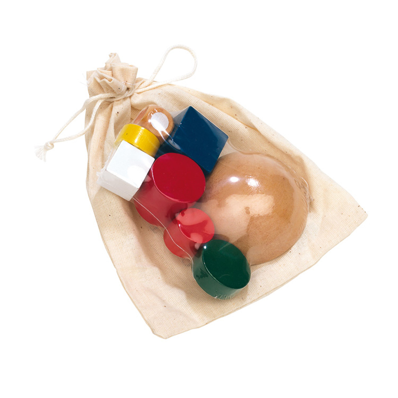 a set of colourful wooden blocks on a natural cotton pouch