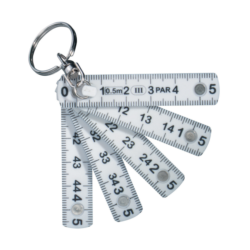 a mini metal folding ruler that has been unfolded revealing the measurments