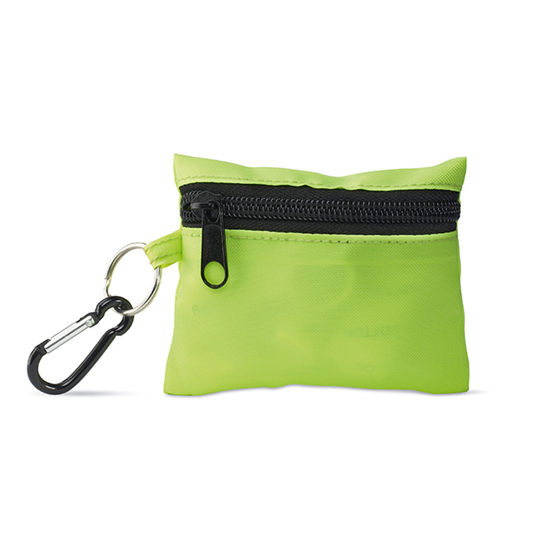 green minidoc first aid kit closed with attached carabiner