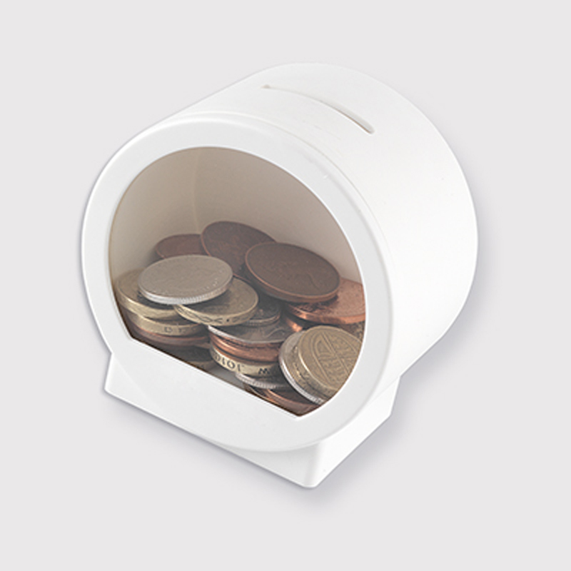 Dome shaped Money box filled with coins which can be seen through the clear window on the front
