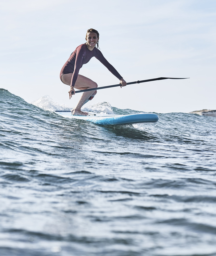 Original red Paddle Board On Water