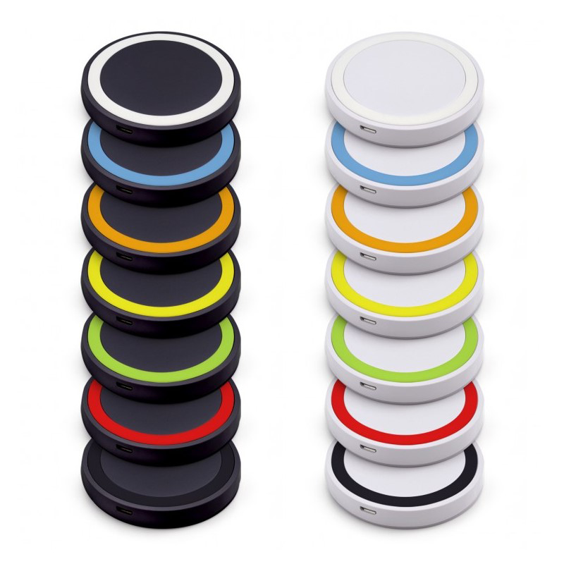 White and black round charging pads in a range of different colour trims