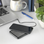 Fabric topped charging pad with mobile phone