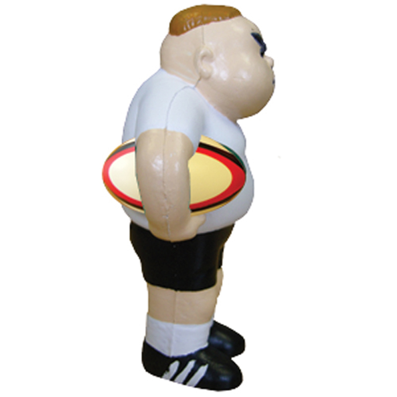side view of a stress rugby player holding onto a rugby ball