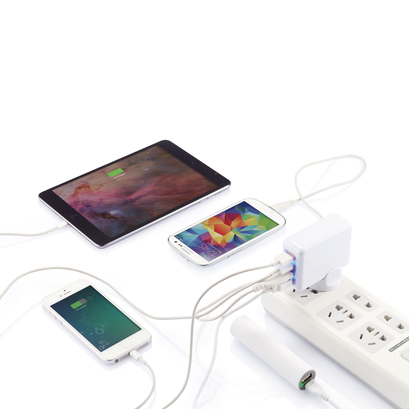 USB Port Travel Plug in white plugged into devices
