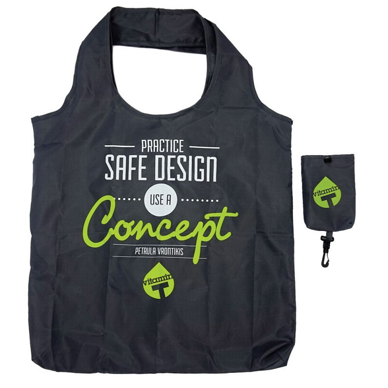 Black round handled foldable shopper in pouch with company logo printed on the front of the bag