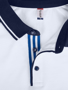 Pittsford Polo Shirt in White With Navy Details Close Up of Front Buttons