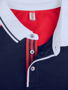 Pittsford Polo Shirt in Navy With Red and White Details Close Up of Front Buttons