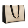 Large cream coloured bag with black side panels and coordinating handles
