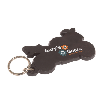 black keyring shaped like the outline of a motorbike with a three colour cog logo to the front