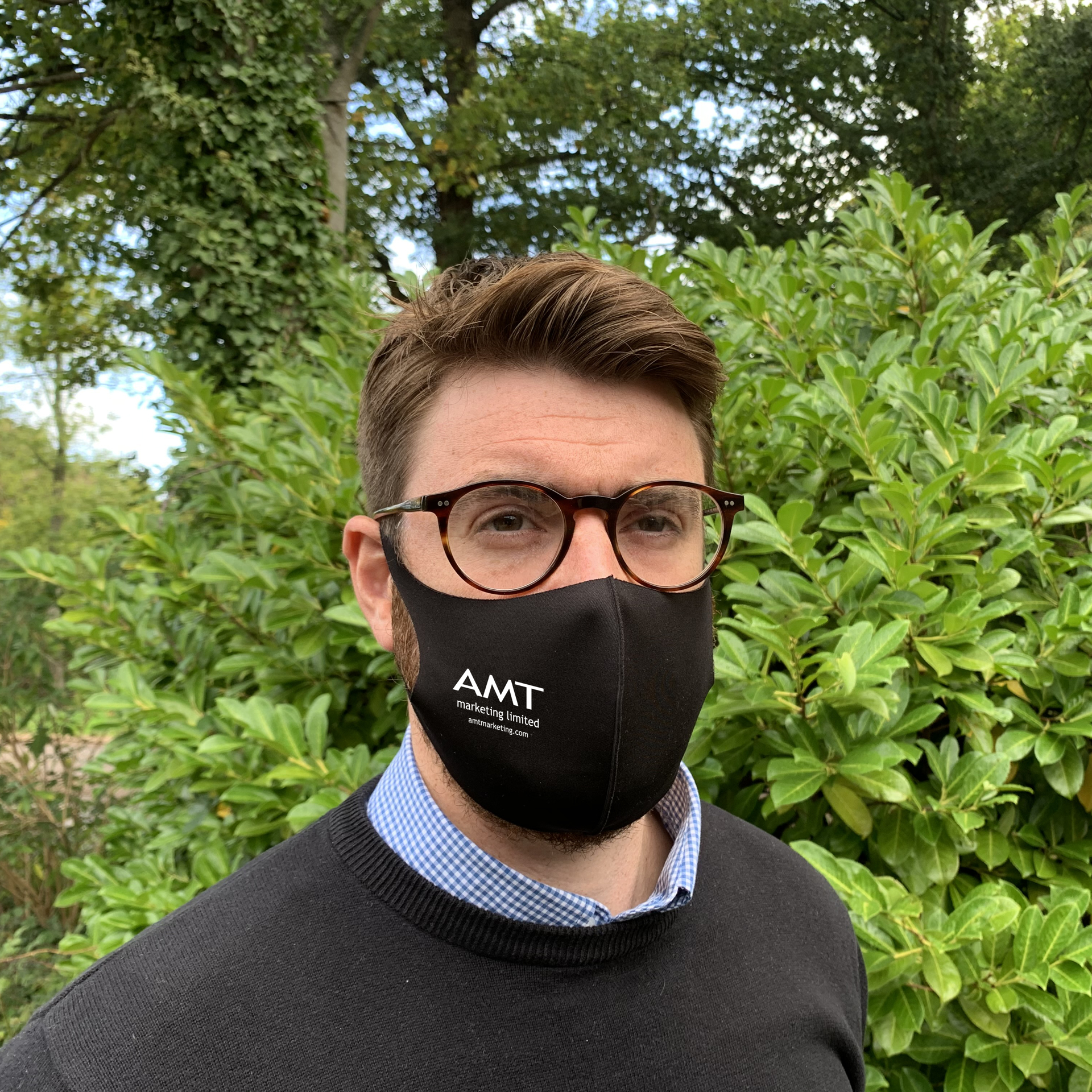 1 Layer Comfortable Face Mask in black with 1 colour logo being worn