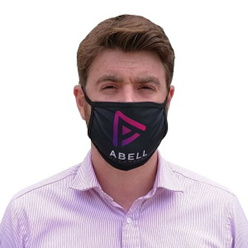 a man wearing  a black face mask with a pink logo to the front