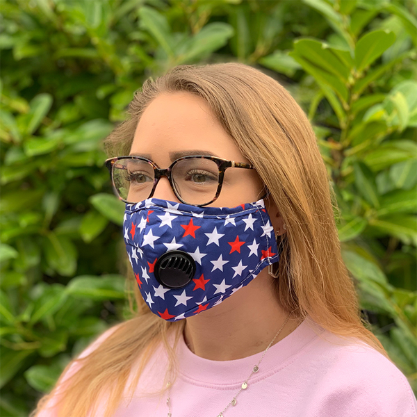 woman wearing face mask with valve with a star print