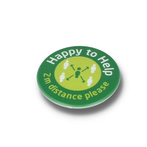 round green badge promoting social distancing