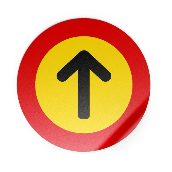 red and yellow floor sticker with arrow