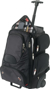 Trolley bag side view with open pull handle and upper storage compartment. 