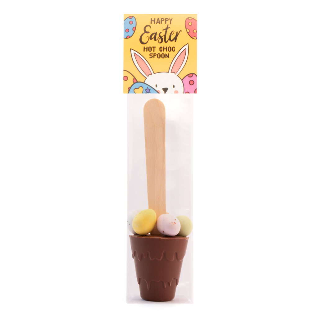 hot chocolate spoon with speckled eggs with a yellow top info card