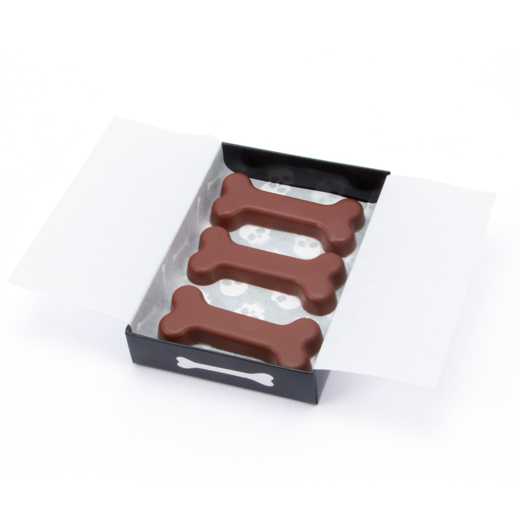 3 milk chocolate bones shown in open eco matchbox