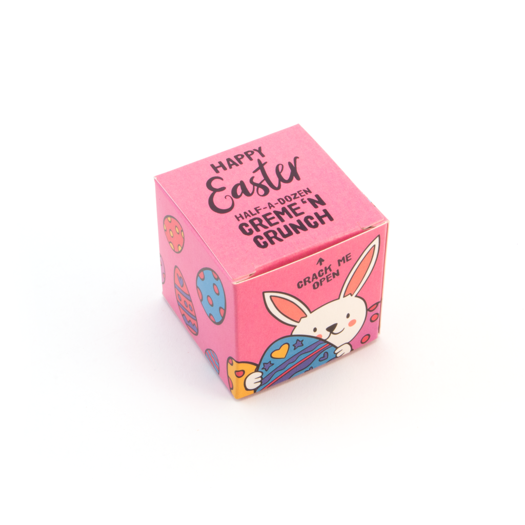 maxi eco cube filled with cream and crunch chocolates with pink branding