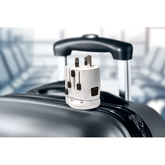 Travel adaptor on suitcase