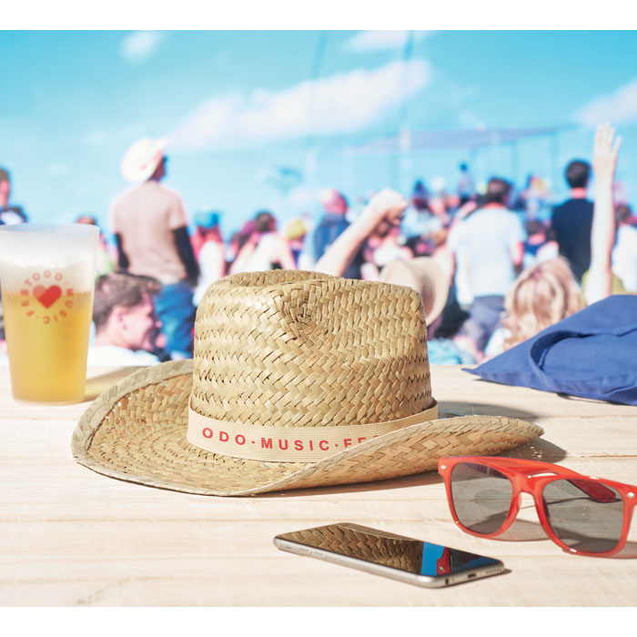 Natural Straw Hat with beige band and print in summer setting