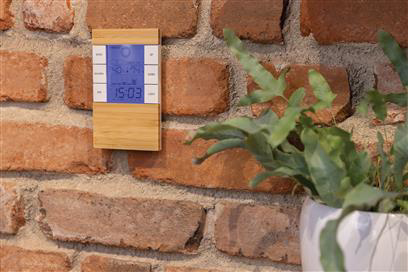 Recycled plastic and bamboo weather station in use