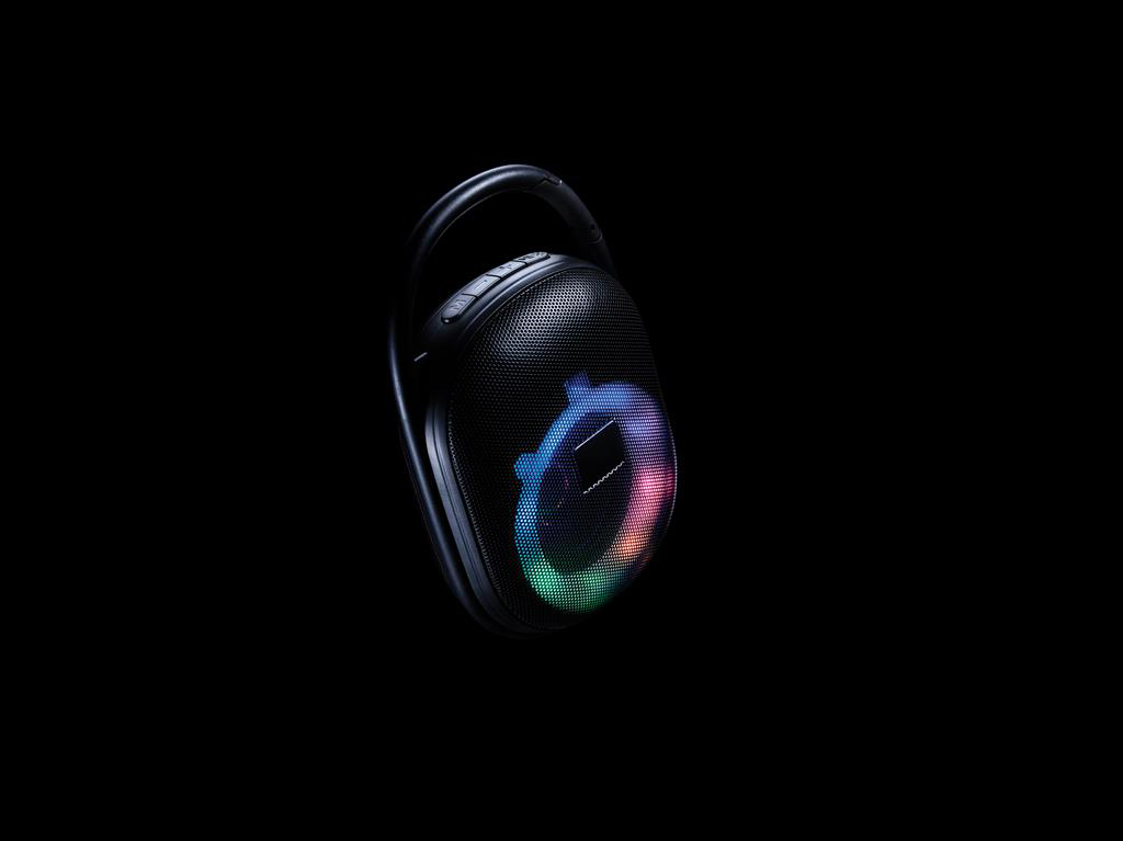 Lightboom speaker in dark with several colours