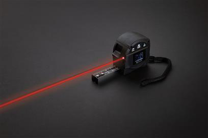 Black measuring tape with the laser being used 