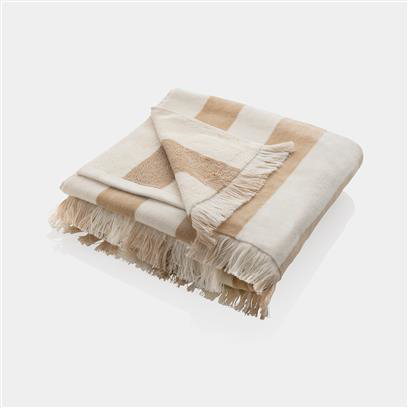 brown striped towel with tassels, folded into a square