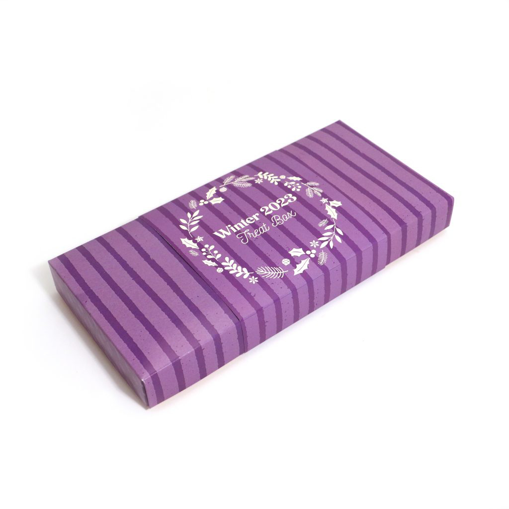 Chocolate treats box packaging in stripey purple box 