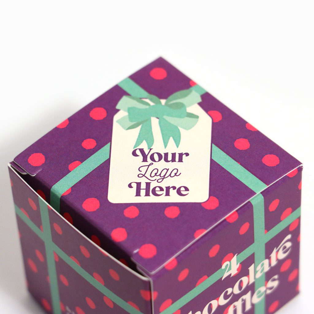 a purple chocolate truffle box / cube, looks like a Christmas present (Diagonal view)