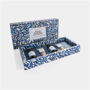 blue marble printed gift box containing a shampoo, body-wash, etc 