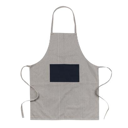 A grey apron with a black front pocket with two ties around the sides