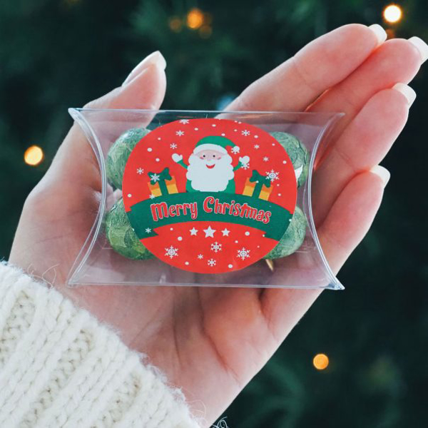Small Christmas Pillow Box with a red print on the front in a circle (with an image of santa) 