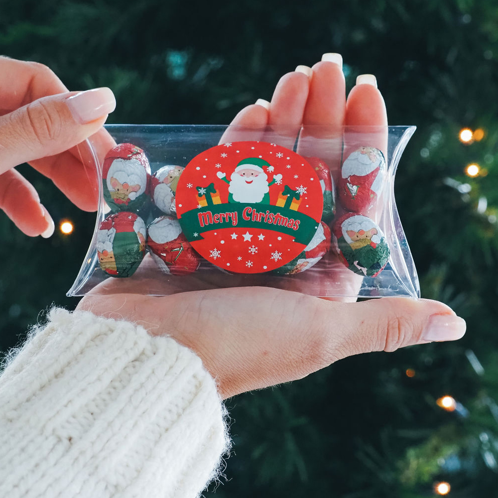 Large Christmas Pillow Box with a red print on the front in a circle (with an image of santa) 