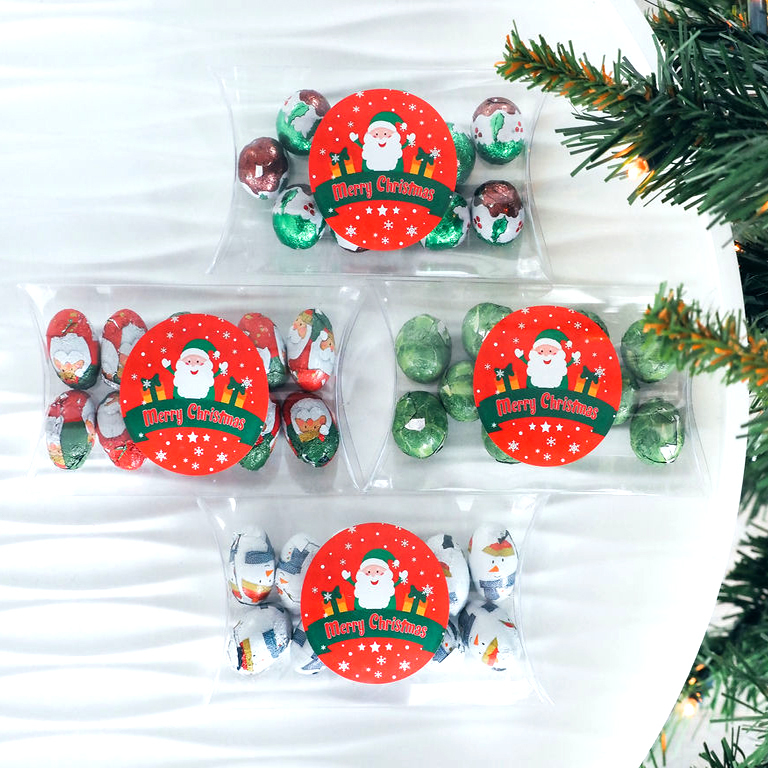 four of the christmas pillow boxes in the large size (8 chocolates)