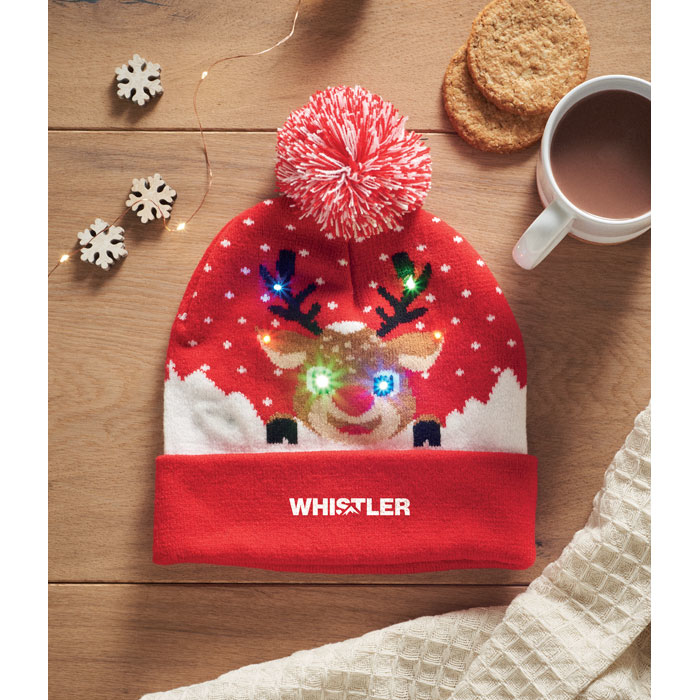 Red bobble hat beanie with a reindeer on the front