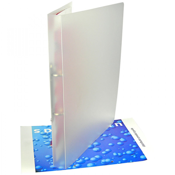 A frosted ring binder on a blue mat 