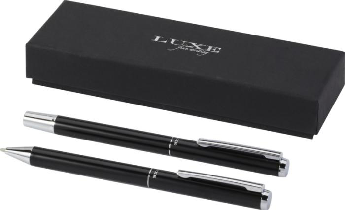 Two black pens and a sleek black gift box 