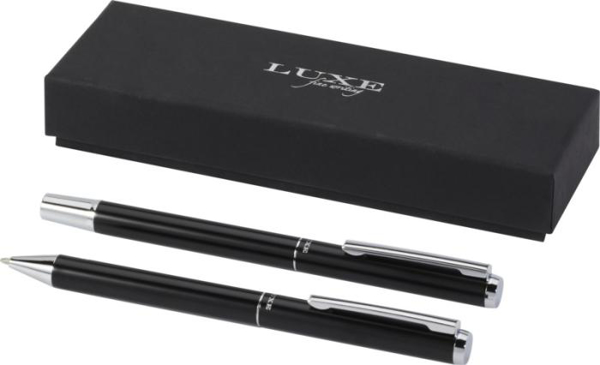 Two black pens and a sleek black gift box 
