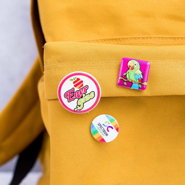 Bag displaying various badge sizes and shapes