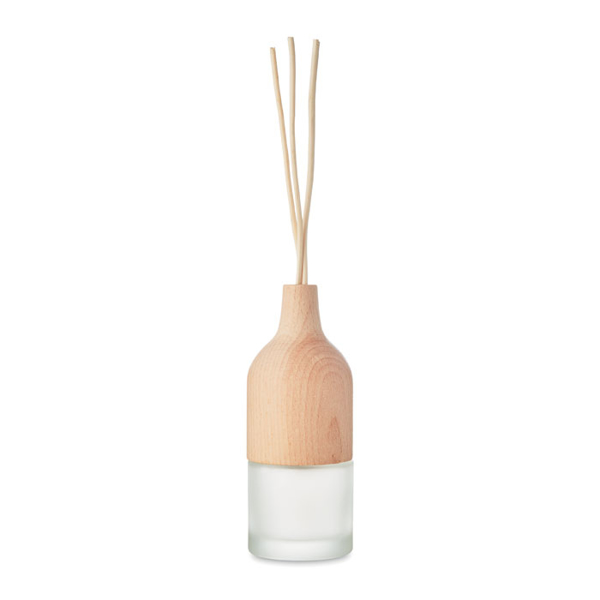 a transparent diffuser with a brown top and brown fragrance sticks 